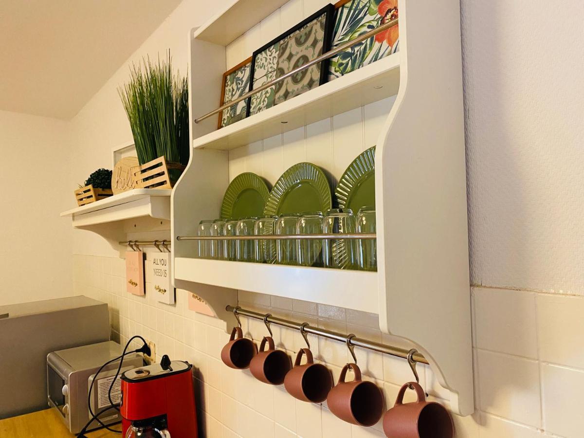 Tm Aparts Dortmund Exteriör bild A wall-mounted plate rack